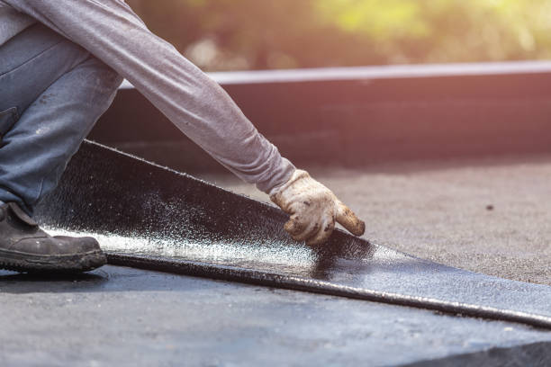 Professional Interior Drainage System technician working in Brentwood, NY